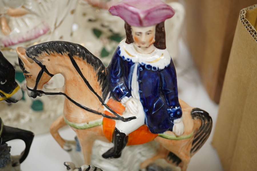 A pair of 19th century Staffordshire pottery models of Zebra, two pairs of Staffordshire pottery equestrian groups, largest 21cm high (6) Condition - some minor breaks and repairs